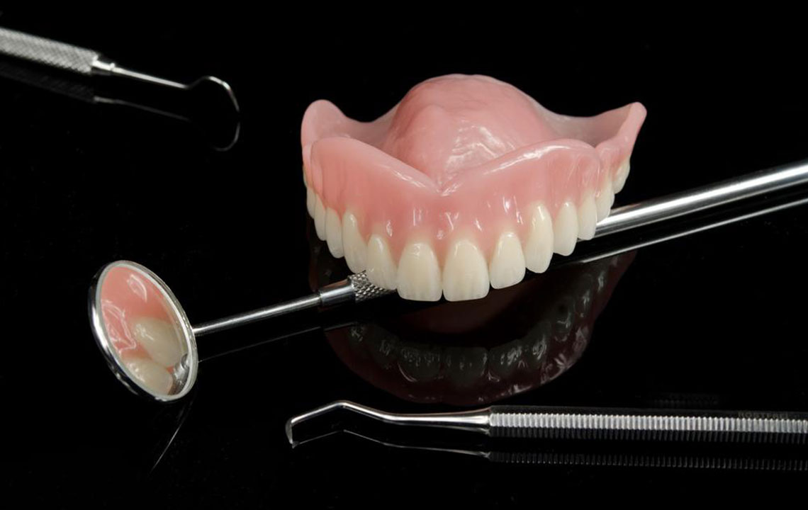 Pros and cons of dentures